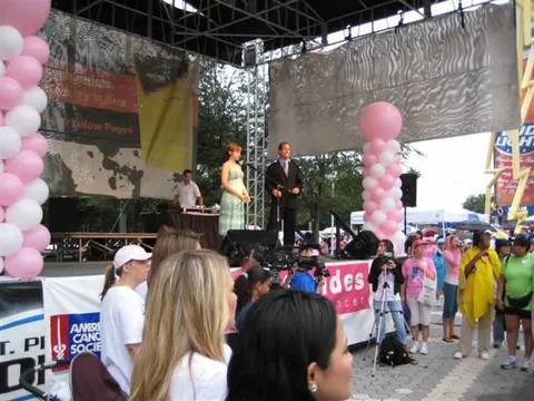 Tom Workman and Jolanda Nel on stage at the American Cancer Society Breast Cancer Walk